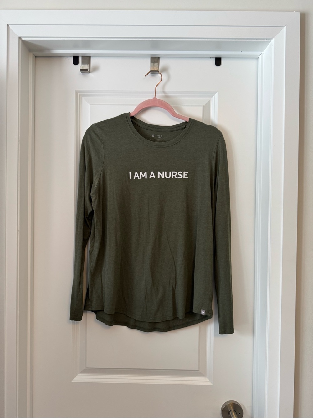 FIGS Olive Green Long Sleeve Tee with "I AM A NURSE" Graphic